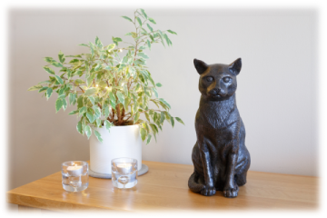 Zittende kat miniatuur